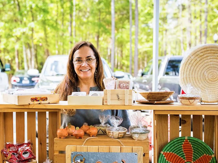 A cultural booth with handwoven baskets and crafts